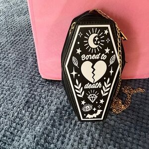 Novelty cross body purse shaped like coffin